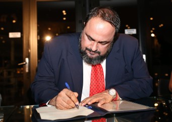 Evangelos Marinakis signs The Principle of Athens